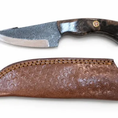 Fixed-Blade Knife With Tooled Leather Sheath