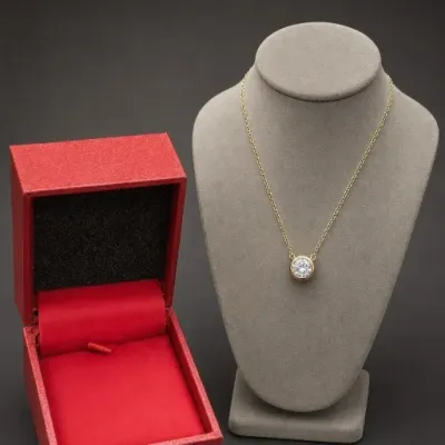 Gold-Tone Necklace With Clear Stone Pendant and Red Box