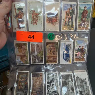 Assorted Collectible Cigarette Cards in Plastic Sleeve