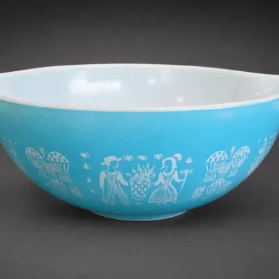 Blue and White Pyrex Mixing Bowl With Folk Motif