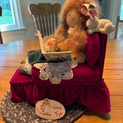 Lizzy High doll reading book with friends