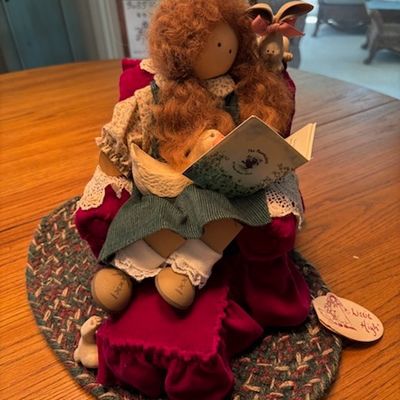 Lizzy High doll reading book with friends