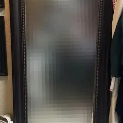 Traditional-style rectangular full-length floor mirror featuring a dark brown wood frame w
