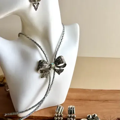 Bow Necklace with Iridescent Rhinestones & Four Coordinating Earring Sets 