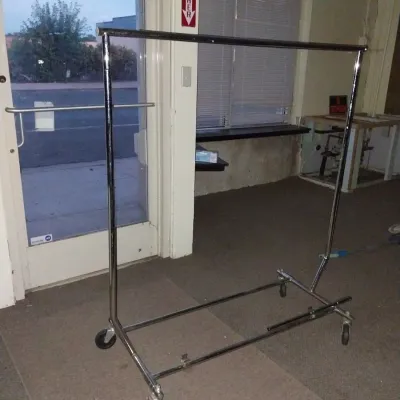 Folding rolling clothes rack