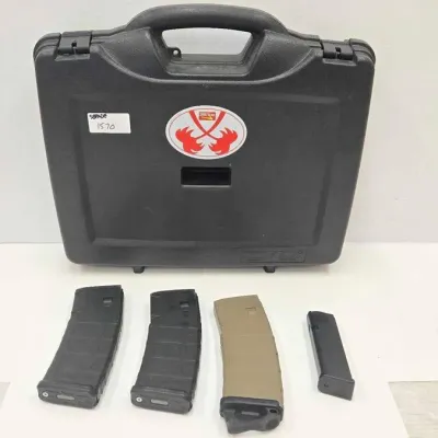 1570 promax gun case and 30rd rifle magazines