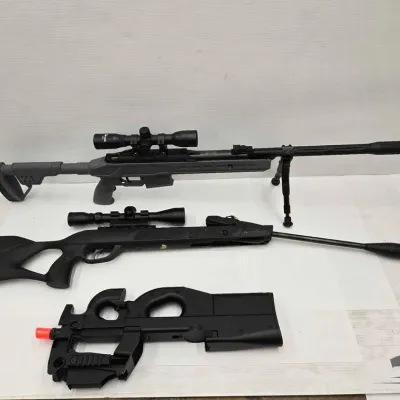 Sale Photo Thumbnail #326: 2102 3 air soft rifles
