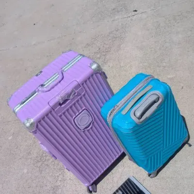Two Hardside Spinner Suitcases Paired with a Digital Smart Scale