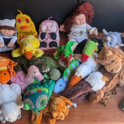 An Assorted lot of Vintage and mlmodern Stuffed Plush Animals and Mostly Hand Puppets