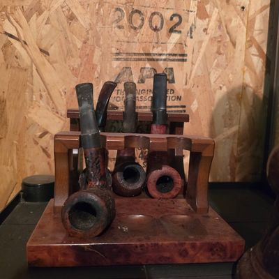 Vintage Wooden Tobacco Pipe Rack with Four Estate Pipes