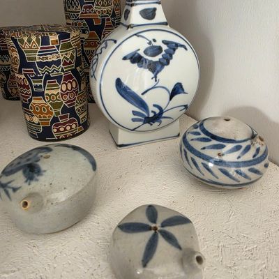 Collection of Decorative Ceramic Vessels including Moon Flask and Oil Lamps