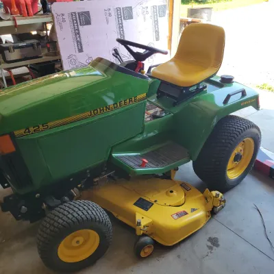 Sale Photo Thumbnail #456: John Deere 425 All-Wheel Steer Garden Tractor – 54” Deck – 507 Hours - This item WILL BE OFFERED FOR EARLY SALE (PLEASE CONTACT US DIRECTLY IF YOU ARE INTERESTED)