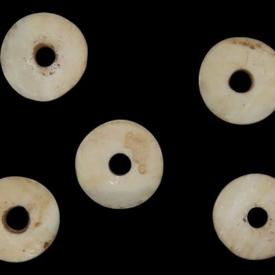 Sale Photo Thumbnail #807: Nice Lot of Cahokia Shell Disc Beads found in Madison County Illinois.