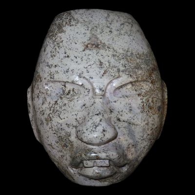 Sale Photo Thumbnail #345: Phenomenal 7 3/4" Teotihuacan Mask, Central Mexico. Motley COA. Oustanding example with Great details, incredible polish, and wonderful color! Ex Dr. Robert Gonzalo Collection.