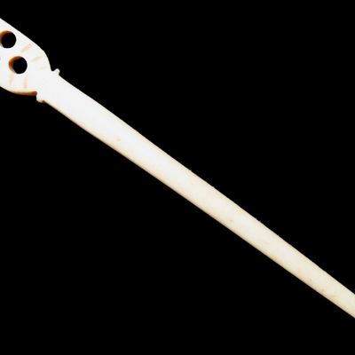 Sale Photo Thumbnail #46: Rare Owl Effigy Polished Bone Hairpin found in North Dakota. Amazing example with great polish and no brainer patina.