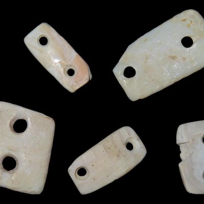 Sale Photo Thumbnail #415: Lot of 5 Pre-Columbian Drilled Shell Gorgets / Pendants / Beads found in Mexico.