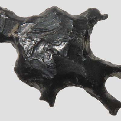 Sale Photo Thumbnail #73: Rare Obsidian Human Effigy Eccentric found on Private Property by Alan Forsage in S.E. New Mexico.