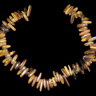 Sale Photo Thumbnail #913: Vintage 16" Strand of Irredescent Tiger Eye Beads / Pendants. 70-80 Pieces, very colorful, all fully polished and drilled.