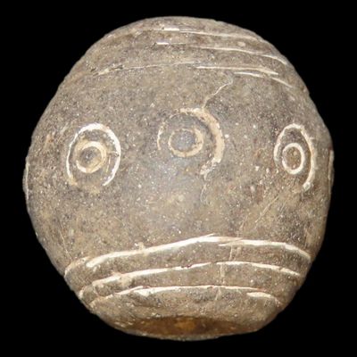 Sale Photo Thumbnail #325: Engraved Pre-Columbian Effigy Clay Bead, Nicely Deigned Example. Mexico.