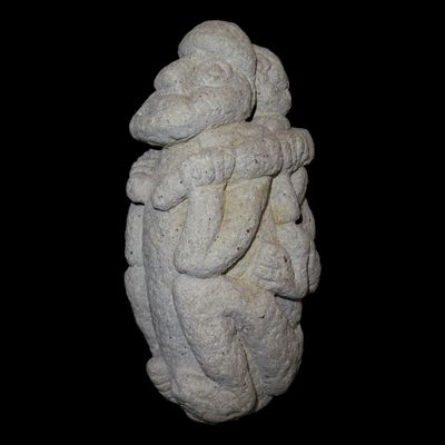 Sale Photo Thumbnail #393: Massive 10" Pre-Columbian Chavin Human Effigy Mother with Child Stone Carving, Andean Highlands of Peru. Motley COA. Very elaborately carved sculpture of a person with a child on their back.