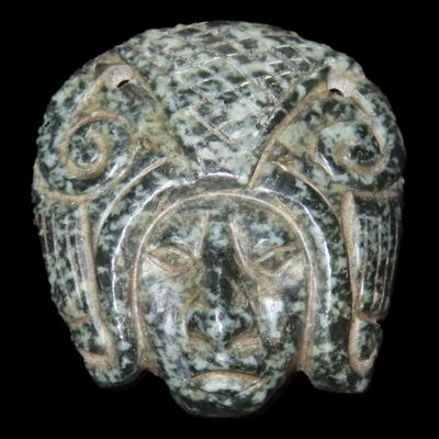 Sale Photo Thumbnail #385: Amazing Pre-Columbian Human Effigy mask / Maskette Pendant found in Mexico. Motley COA. Very Colorful Jadeite with amazing detail and great Polish.