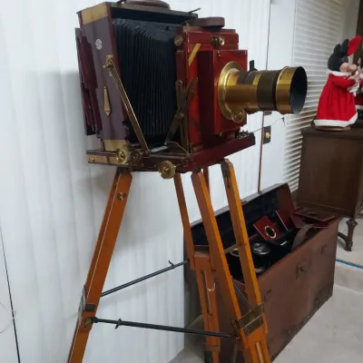 Sale Photo Thumbnail #2: Vintage Tripod Camera with original case and plates