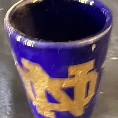 Vintage Notre Dame Fighting Irish Cobalt Blue & Gold Ceramic Shot Glass