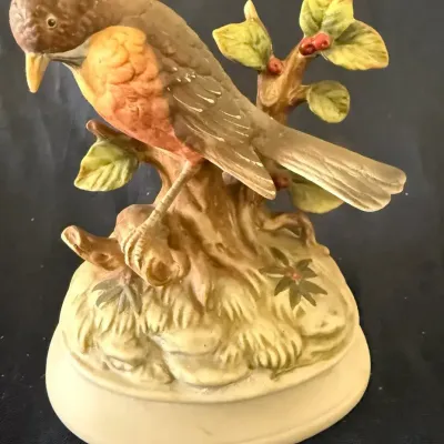 Vintage Robin on Holly Branch Porcelain Music Box Figurine