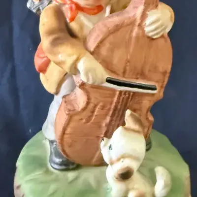 Vintage Porcelain Boy Playing Cello with Puppy Music Box – 7½”