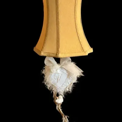 Ornate Gold-Tone Table Lamp with Decorative Accents