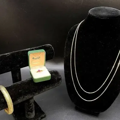 Yellow Gold-toned Lot Featuring A Pink Gemstone Ring, Bangle Bracelet And 27” Chain