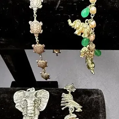 Sterling Silver Noah’s Ark Bracelet, A Metzke Pewter Elephant Pendant & Silver-Toned Charm Bracelets