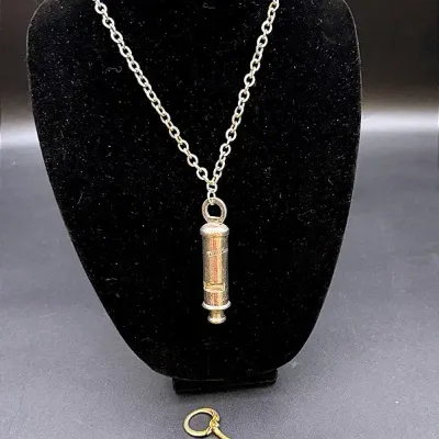 The Metropolitan Police Whistle Made In England & Gold-toned Mini Whistle Keychain