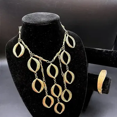 Gold-toned Statement Necklace And Hinged Bracelet