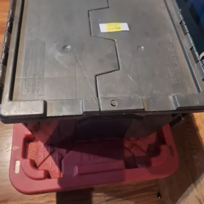 black storage container with lego pieces