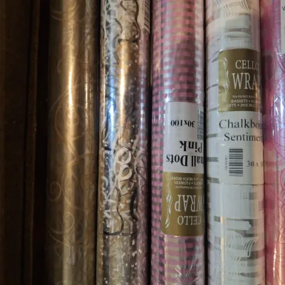 assorment of cello wrap rolls.
