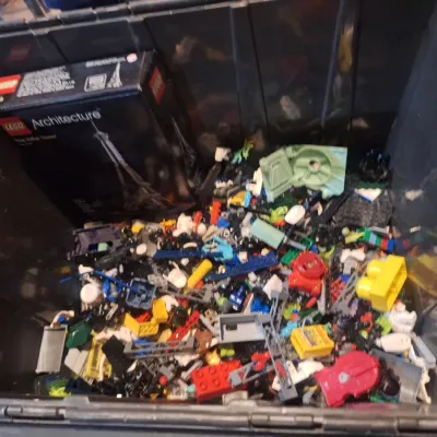 black storage container with lego pieces