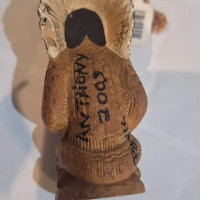 Ornament- Native American Style Seated Hunter Warrior Figurine with Feather Headdress & Rifle