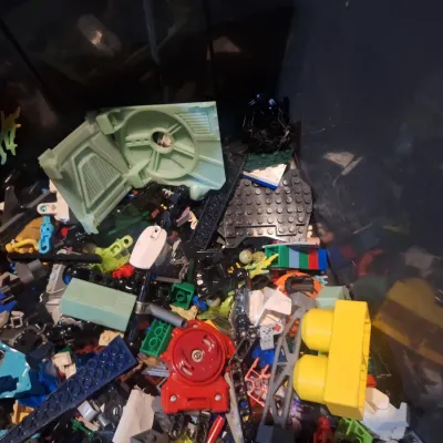 black storage container with lego pieces