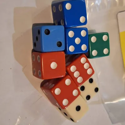Lot of 9 Assorted Vintage-Style Colorful Six-Sided Dice – Red Blue Green & Ivory