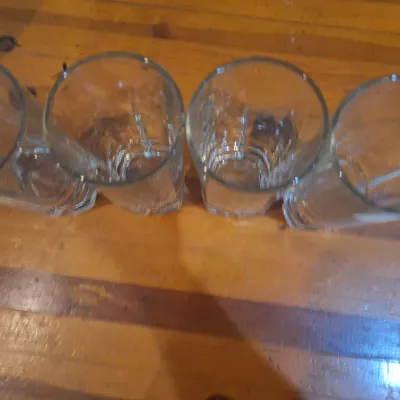 Set of 4 Clear Glass Tall Tumblers with Heavy Geometric Faceted Bases