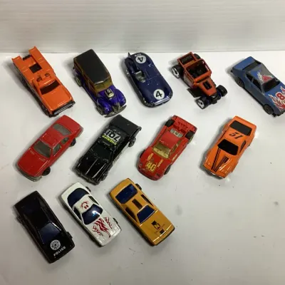 Vintage Hot Wheels & Matchbox Die-Cast Toy Car Lot – 12 Vehicles, Race Cars, Police Car, Hot Rod & Trucks