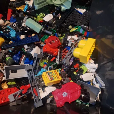 black storage container with lego pieces