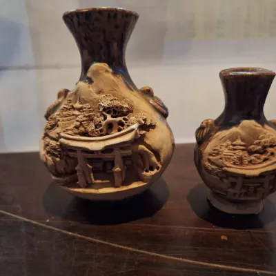 Pair Chinese Asian Ceramic Relief Landscape Vases Brown Drip Glaze Pagoda Temple Scenic Design