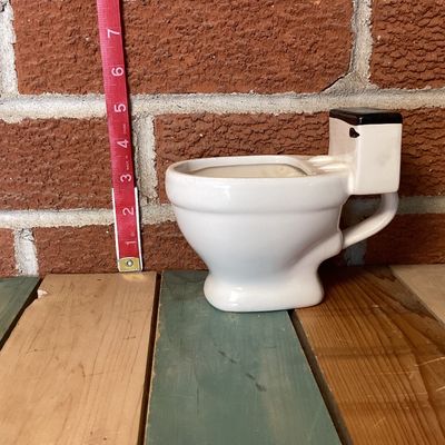 Typo Ceramic Toilet Mug with Novelty Swirl Detail