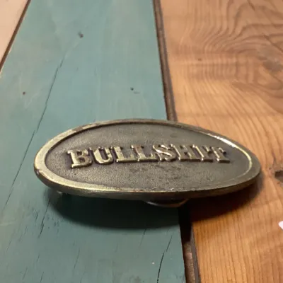 Vintage 1982 The Great American Buckle Co. 'Bullshit' Brass Belt Buckle