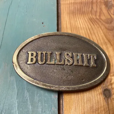 Vintage 1982 The Great American Buckle Co. 'Bullshit' Brass Belt Buckle