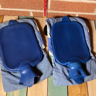 Pair of Vintage Novelty Hot Water Bottles with Cat and Dog Fabric Covers