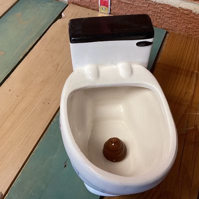 Typo Ceramic Toilet Mug with Novelty Swirl Detail