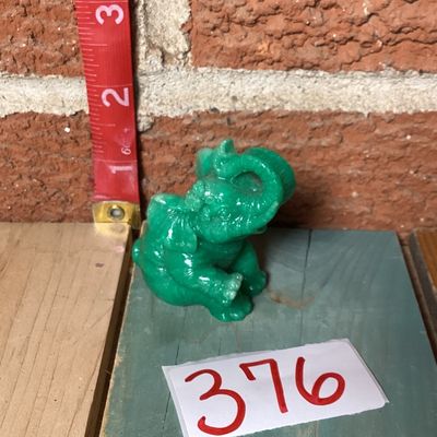 Carved Green Faux-Jade Resin Elephant Figurine